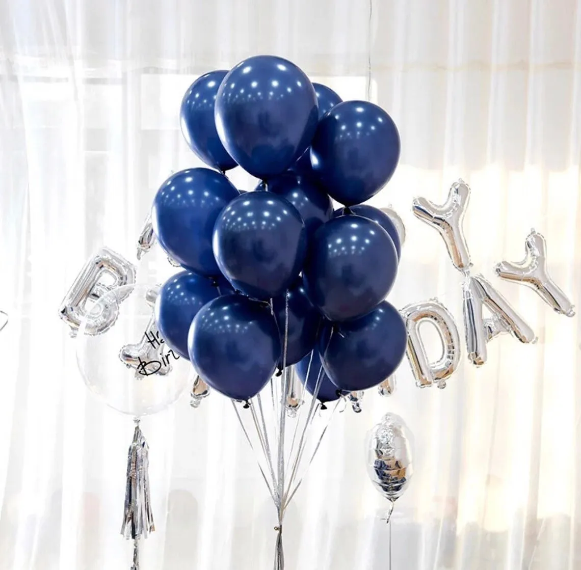 red balloons with black polka dots